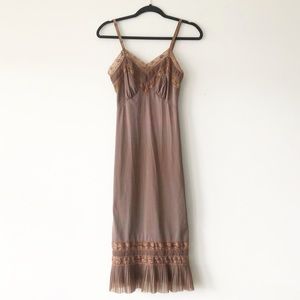 Gorgeous Vintage Slip in light chocolate brown . Lace around bodice and pleated